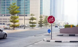 stop sign road city modern buildings background dubai uae september stop sign road city modern 145047331